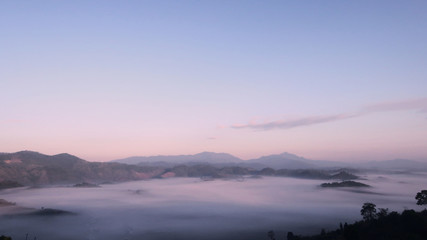The fog in the morning before sunrise over mountains