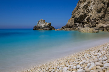 Fototapeta na wymiar beautiful Milos beach and deep blue sea on Lefkada island in Greece