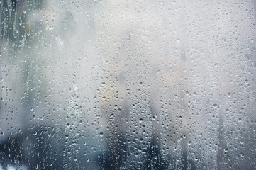 Rainy background, rain drops on the window, autumn season backdrop, abstract textured wallpaper - obrazy, fototapety, plakaty