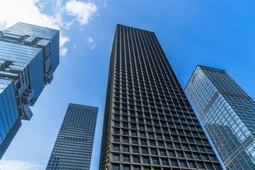 modern office building against blue sky.