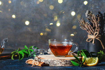Tea ceremony, filled with a cup with a fragrant drink, surrounded by plant decorations against a...