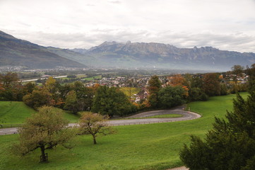 Fototapeta na wymiar view over the river Rhine valley to Switzerland from Vaduz on an autumn afternoon, Lichtenstein, Europe