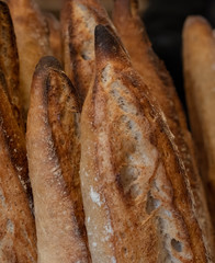 Close up of sour dough bread baguette loaves, photographed at a bakery near Bruton in Somerset, UK.