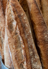Close up of sour dough bread baguette loaves, photographed at a bakery near Bruton in Somerset, UK.