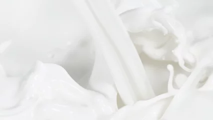 Fotobehang Macro shot of pouring cream in detail © Jag_cz
