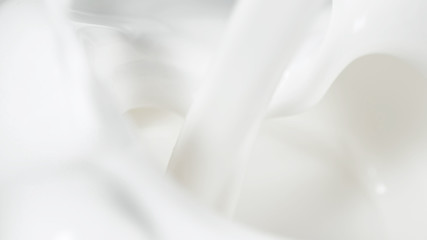 Macro shot of pouring cream in detail