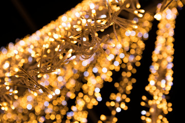 New Year lights abstract photo. Blurred lights on background. Christmas garland