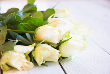 Fototapeta na wymiar Fresh white roses arranged in a bouquet