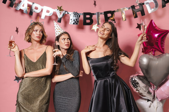 Image of party girls drinking champagne while celebrating birthday