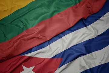 waving colorful flag of cuba and national flag of lithuania.