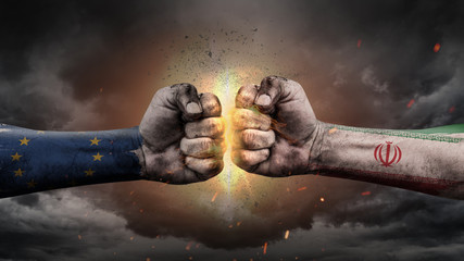 EU vs EU. Fists with flags. Battle EU with Iran on sky.