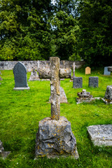 old gravestones in catholic churchyard