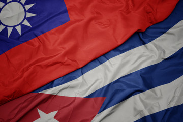 waving colorful flag of cuba and national flag of taiwan.