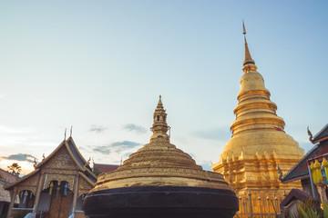 Naklejka premium Wat Phra That Hariphunchai,Lamphun Province,Thailand,beautiful golden pagoda Lanna style