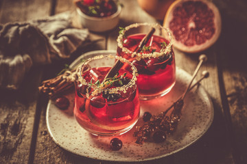 Thanksgiving cocktail - cranberry, cimmanon, grapefruit punch copy space