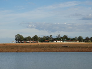 Fototapeta na wymiar Rural Landscapes of Três Marias - Minas Gerais - Brazil, with houses, trees and lakes, and plants