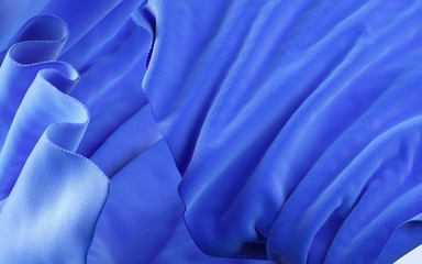 3d rendering illustration of soft cloth blue material on flat background. Horizontal format wallpaper