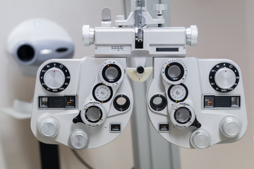 Fototapeta na wymiar Optical equipment for testing vision. Professional Phoropter ophthalmologist technologies in eye medical diagnostic machine, ophthalmology concept
