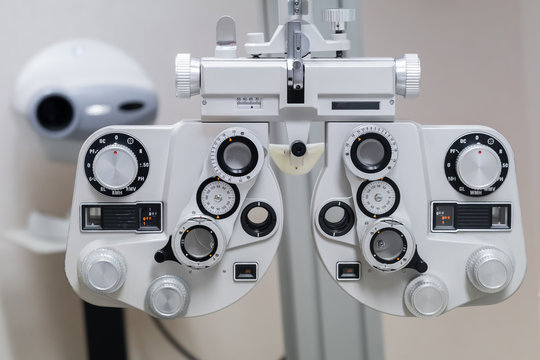 Optical equipment for testing vision. Professional Phoropter ophthalmologist technologies in eye medical diagnostic machine, ophthalmology concept