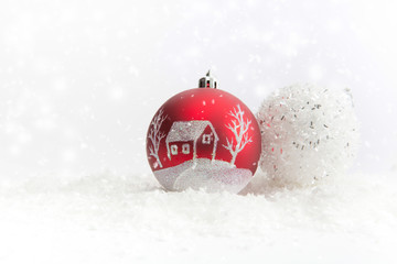 Christmas balls on snow.
