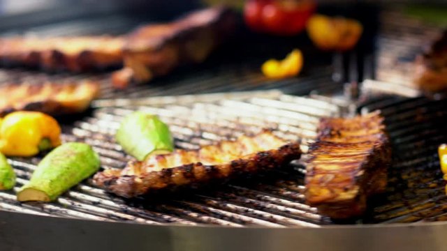 Close-up on rotating barbecue grid