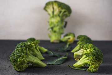 fresh broccoli on wooden table