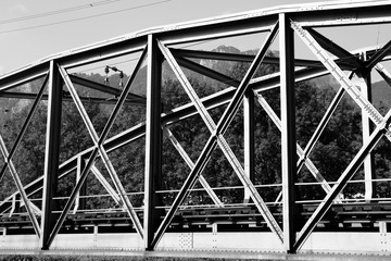 Truss bridge. Black and white vintage style.