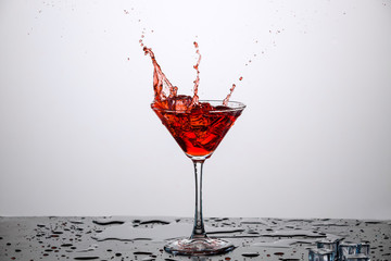 Glass of wine with ice.