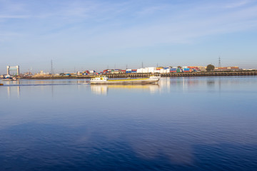 Fototapeta na wymiar A ship at work on River Thames
