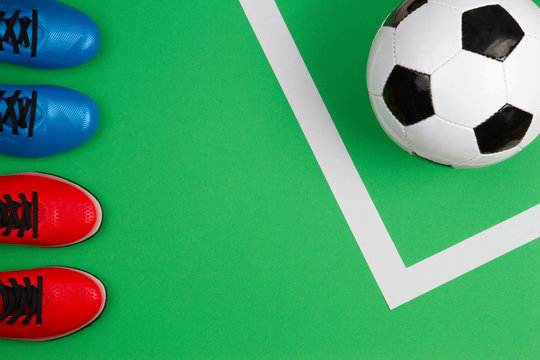 Soccer football players with soccer ball on green background