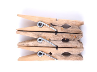 wooden clothespins on a white background