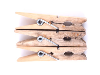 wooden clothespins on a white background