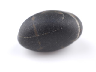 black stone on a white background