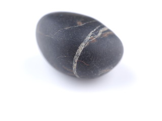 black stone on a white background