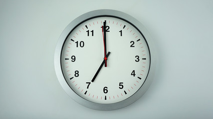 Close up White cock face beginning of time 07.00  am or pm. on White background, Time concept..