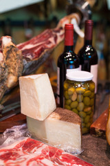 jerked iberic jammon of bacon with wine, cheese and olives