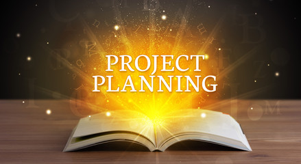 PROJECT PLANNING inscription coming out from an open book, educational concept