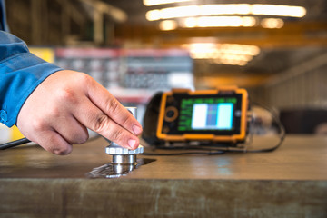 Ultrasonic test to detect imperfection or defect of steel plate in the factory, NDT Inspection.