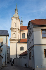 Cityscape of the historical streets of the Old Town in the center of Poland Piotrkow-trybunalski, which is 800 years old: architecture, fortress, churches.