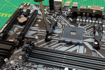Installing a new clasp clamp fasteners fixing bracket system for a personal computer processor...