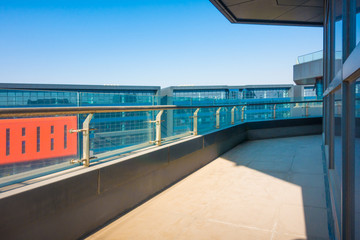 Roof top balcony in the building with cityscape background