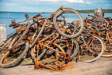 Pile of rusty bicycles got out water, cleaning rivers and canals of Amsterdam from bike debris