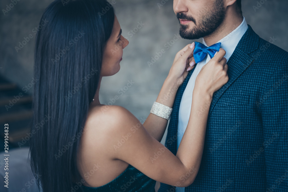 Sticker cropped photo of two chic people couple guy looking lady who fixing taking care of blue stylish bow 