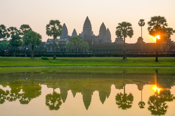 Angkor Wat at sunrise in the reflection of the lake