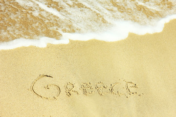 Fototapeta premium holiday inscription on the beach