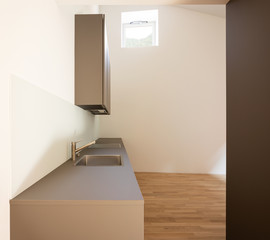 Front view of modern kitchen with washbasin and window overlooking the Swiss hills