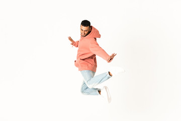 Man dancing street dance style over isolated white background
