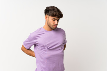 Young handsome man over isolated white background suffering from backache for having made an effort