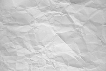 Obraz premium white and gray wide crumpled paper texture background. crush paper so that it becomes creased and wrinkled.