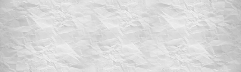wide panorama crumpled paper texture background. crush paper so that it becomes creased and wrinkled.